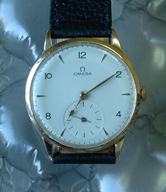 Omega 18k gold 36mm manual cal 265 c1947